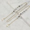 Chaîne lunettes Élégance dorée perles cristal - Maison Lunetik