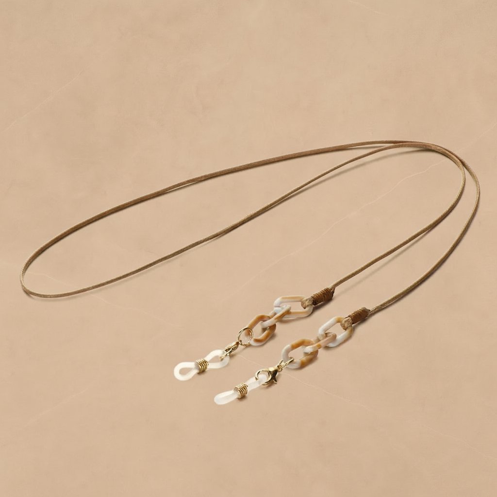 Cordon lunettes beige Élégance maillons acétate marbrés dorés - Maison Lunetik